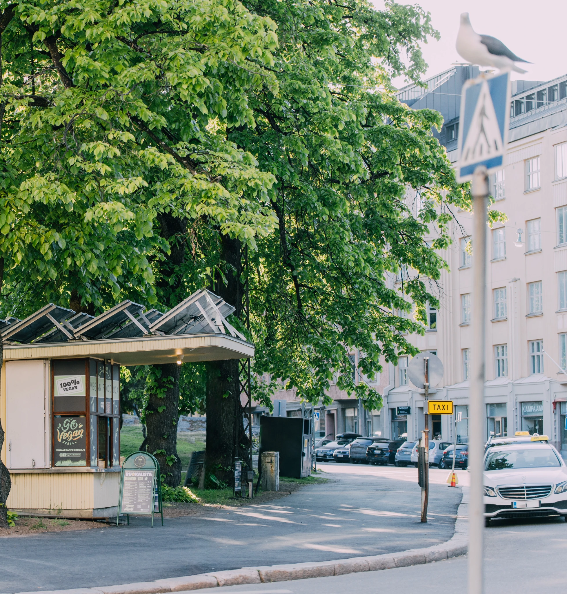 Taxi stand and summer kiosk in the park.